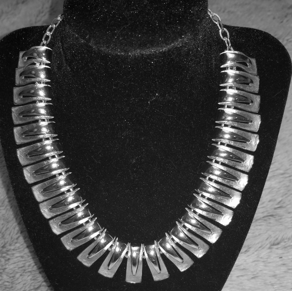 Silver choker.